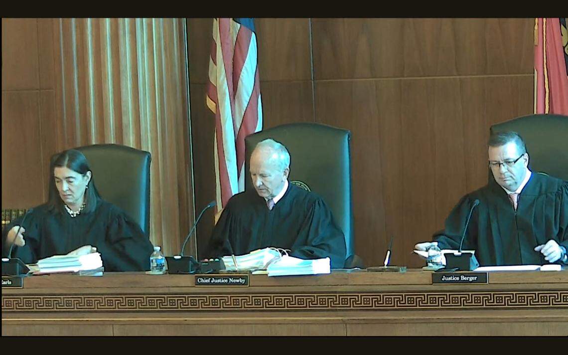 Associate Justice Anita Earls, Chief Justice Paul Newby and Associate Justice Phil Berger Jr. hear arguments in the Leandro case at the N.C. Supreme Court in Raleigh, N.C., on Feb. 22, 2024.