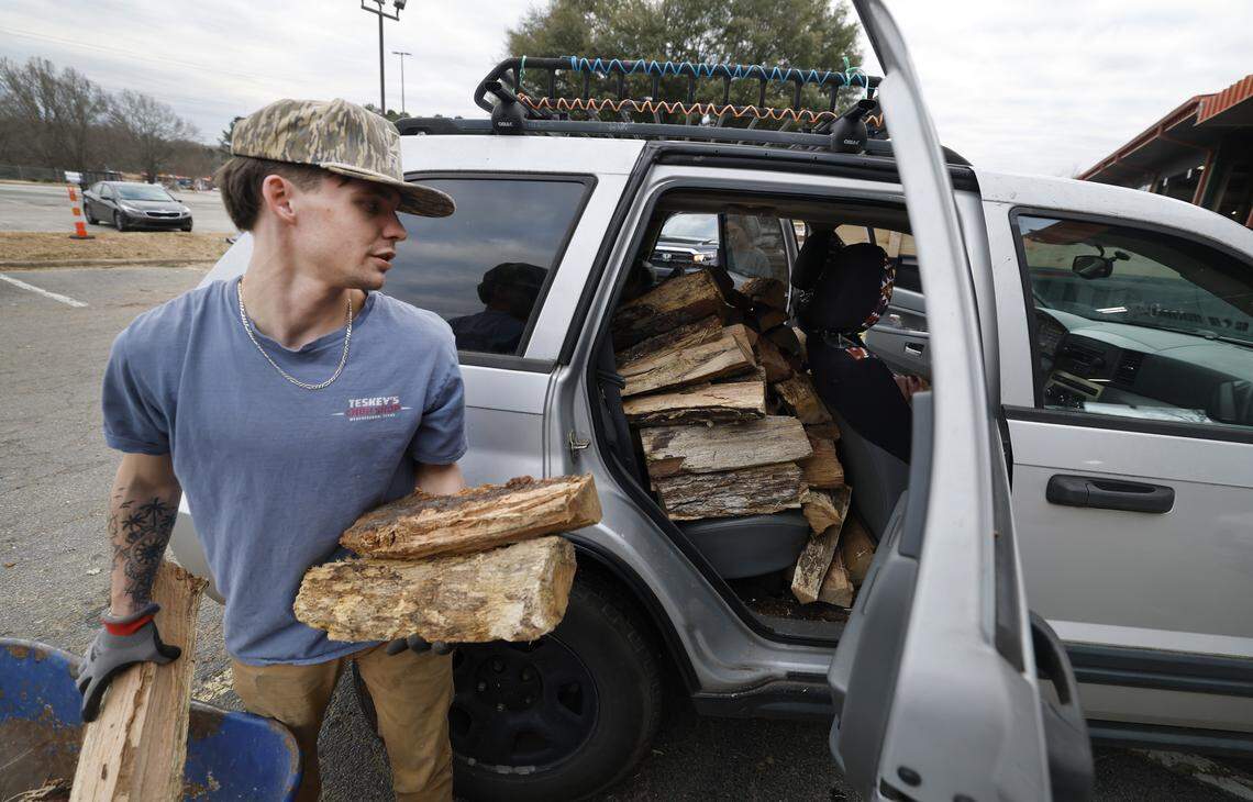 The State Farmers Market was mostly deserted Friday, save for Viann’s Greenhouse, where a steady stream of vehicles were stopping by to buy firewood. Owner Robert Juarez said they sold 25 cords of firewood on Friday and 50 in the last three days. Allie Miller of Raleigh was one of those stopping by, purchasing $100 in firewood that had to be stacked in the backseat of her Jeep with the trunk filled with groceries. Miller was stocking up wood for her fireplace in case she lost power during this weekend’s storm.