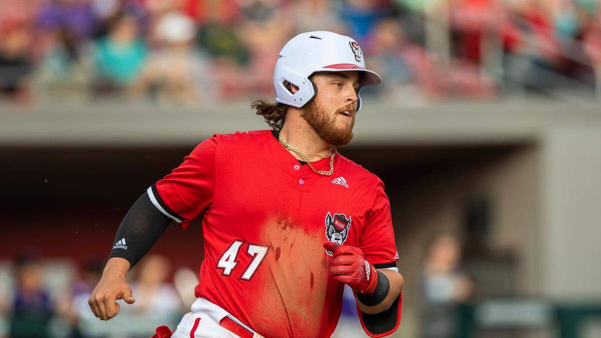 North Carolina State’s Tommy White (47) runs to first base during an NCAA baseball game on Tuesday, Feb. 22, 2022, in Raleigh, N.C. (AP Photo/Ben McKeown)