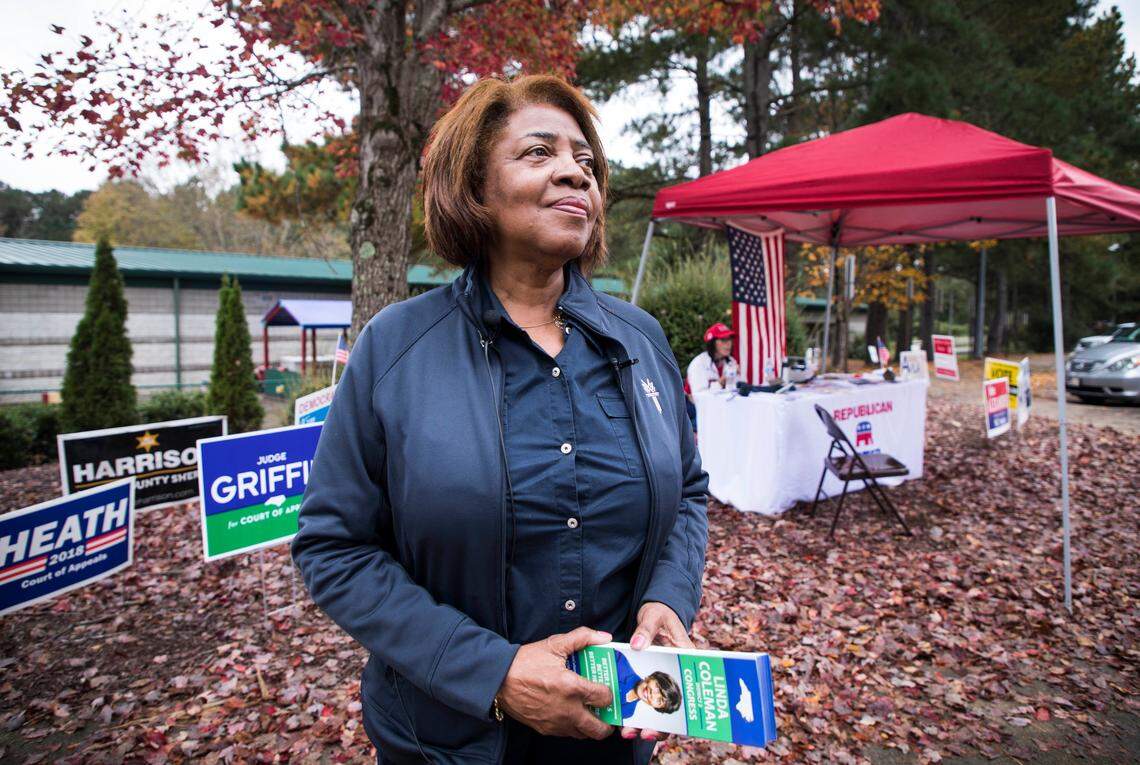 Linda Coleman, a democratic candidate running for Congress in District 2, waits to greet voters outside of Pleasant Union Elementary School on Election Day.