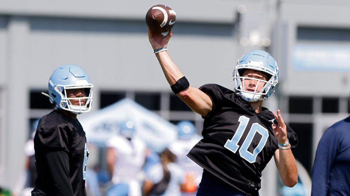 North Carolina quarterback Drake Maye (10) throws a pass during UNC’s first football practice of the season on Friday, July 29, 2022, in Chapel Hill, N.C.