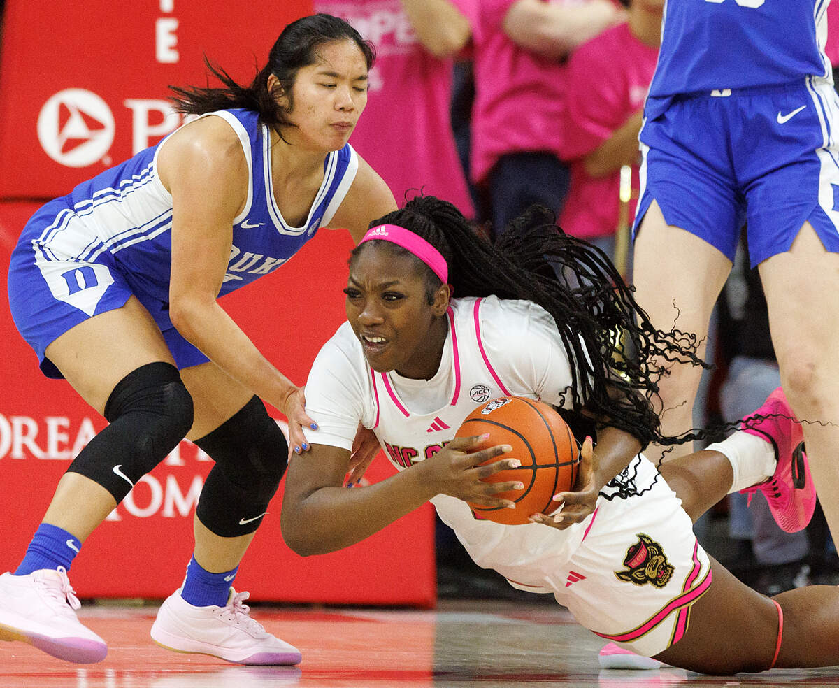 Duke’s Vanessa de Jesus pressures N.C. State’s Lorena Awou during the first half of the Wolfpack’s 89-83 win in the Play4Kay Game on Monday, Feb. 3, 2025, at Reynolds Coliseum in Raleigh, N.C.