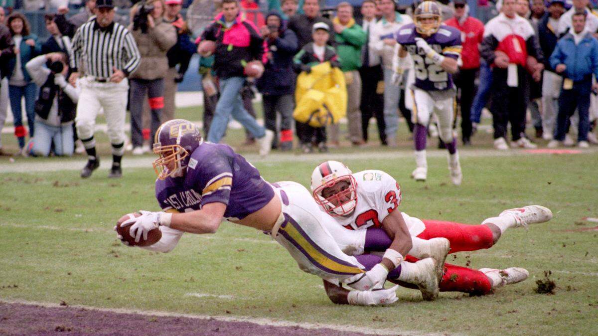 East Carolina’s Luke Fisher scores what would be the winning touch during the Pirates’ 37-34 victory over N.C. State in the 1992 Peach Bowl. ECU rallied to win after being down 34-17 with 8:41 left in the game.