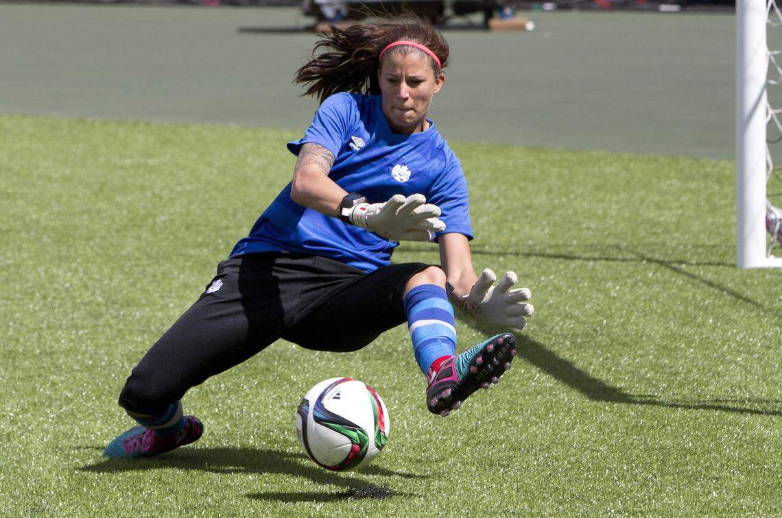 Team Canada’s goalkeeper goalkeeper Stephanie Labbe makes a save during a practice session in Edmonton, Alberta, on Friday June 5, 2015. Canada takes on China in their first Women’s World Cup match on Saturday June 6, 2015. (Jason Franson/The Canadian Press via AP) MANDATORY CREDIT