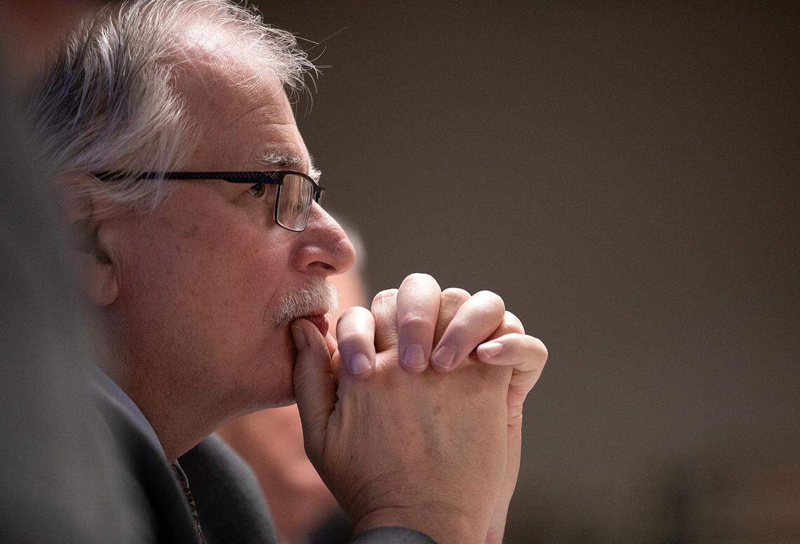 Sam Watts, executive administrator of the State Health Plan, listens as the plan’s board of trustees debate options for coverage of weight loss drugs during a meeting on Thursday, Jan. 25, 2024, in Raleigh, N.C.