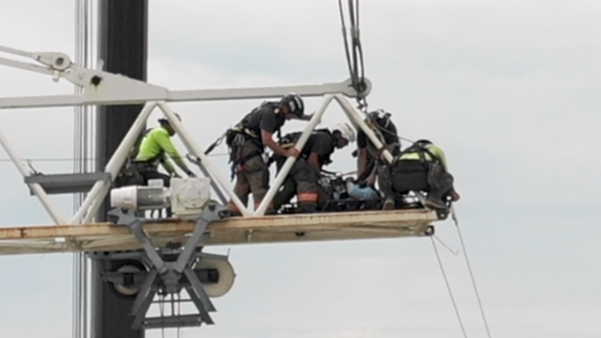 Durham firefighters rescued an injured man working on downtown Durham high-rise on Foster Street Saturday morning, July 29, 2023.
