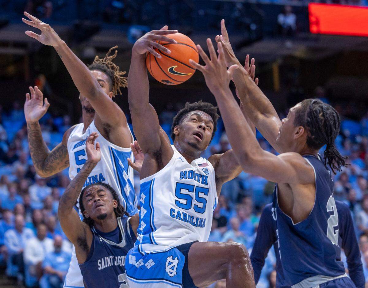 North Carolina’s Harrison Ingram (55) secures an offensive rebound in the first half against St. Augustine’s on Friday, October 27, 2023 at the Smith Center in Chapel Hill, N.C.