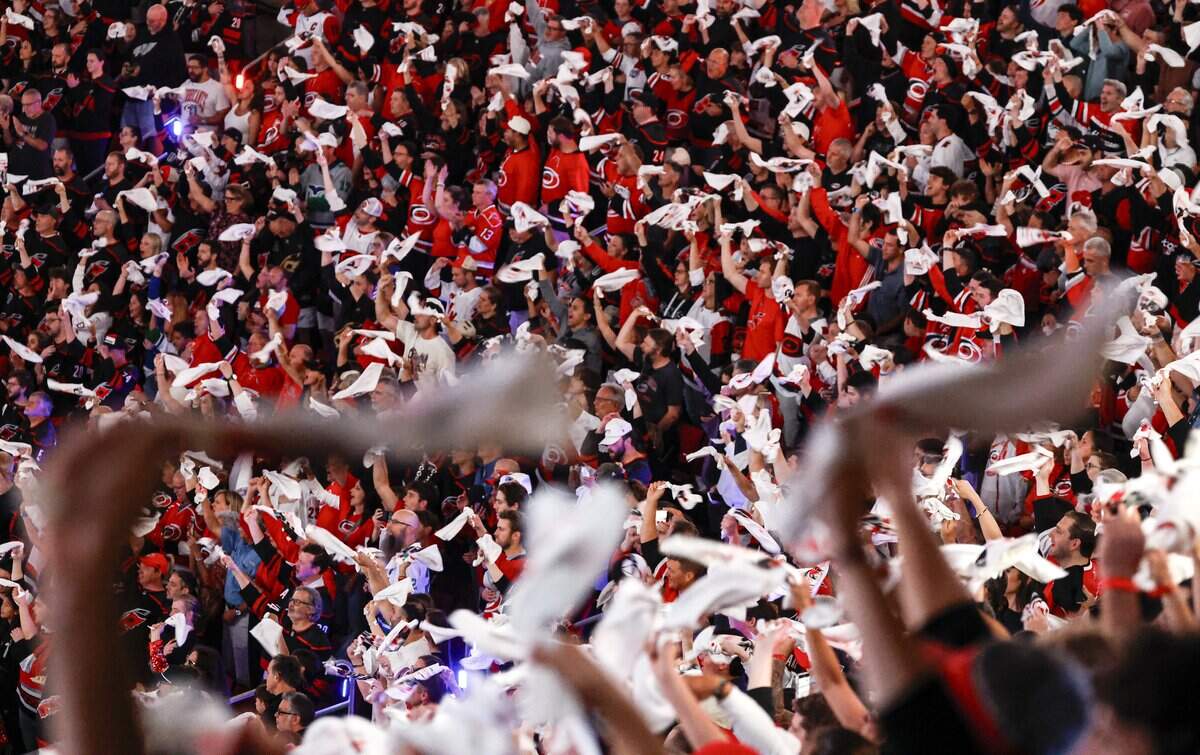 Canes fans cheer on the team before the Hurricanes’ game against the Golden Knights in the fifth game of the Stanley Cup Final at the Lenovo Center in Raleigh, N.C., Thursday, June 11, 2026.