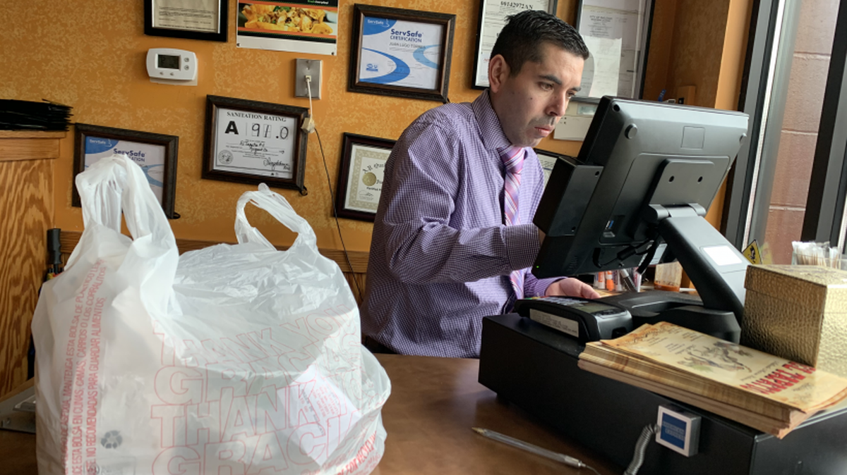 Cesario Mata of the El Tapatio restaurant in Raleigh prepares takeout. Dining rooms of the restaurants have been closed due to the coronavirus outbreak, limiting sales to take-out and home delivery.