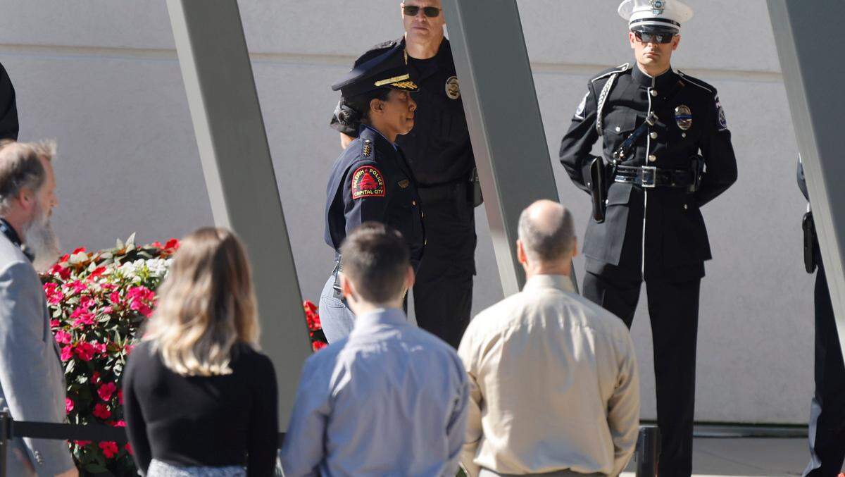 Raleigh Police Chief Estella Patterson heads into Cross Assembly Church in Raleigh, N.C. for the funeral of Officer Gabriel Torres Saturday, Oct. 22, 2022. Officer Torres was killed during a mass shooting Oct. 13.