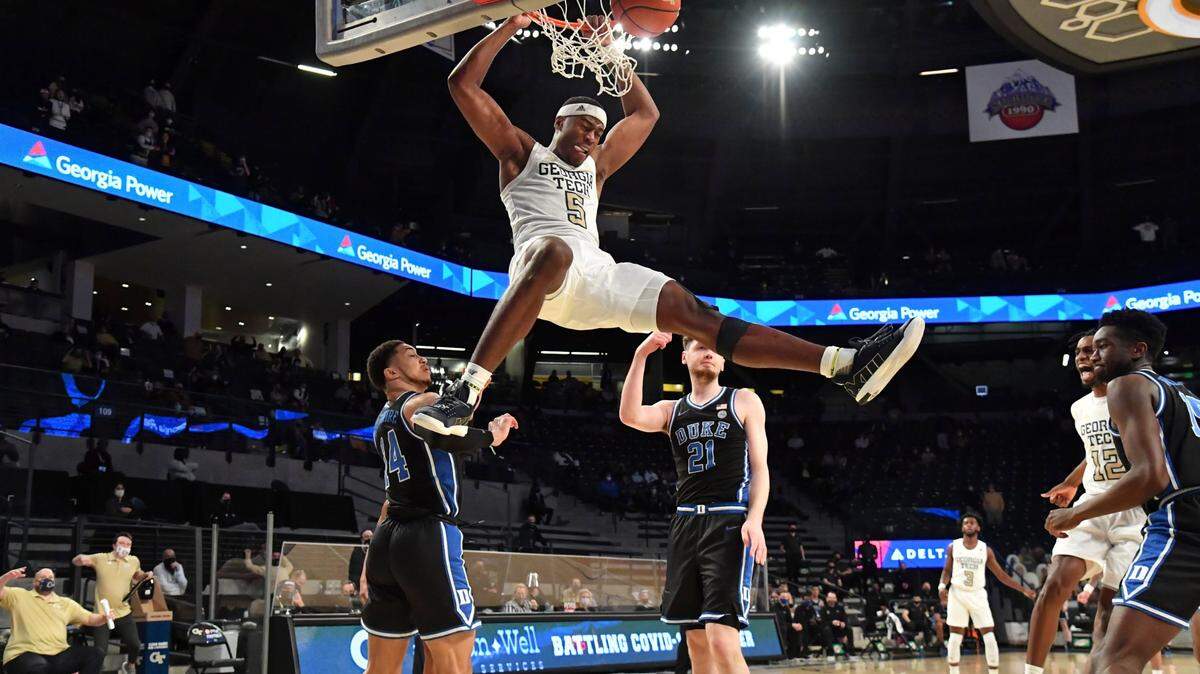 Georgia Tech forward Moses Wright (5) hangs from the basket after dunking against Duke during the second half of an NCAA college basketball game Tuesday, March 2, 2021, in Atlanta.