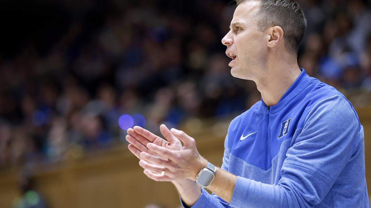 Duke head coach Jon Scheyer applauds his team during the second half of the Blue Devils’ game against Bellarmine at Cameron Indoor Stadium on Monday, Nov. 21, 2022, in Durham, N.C.