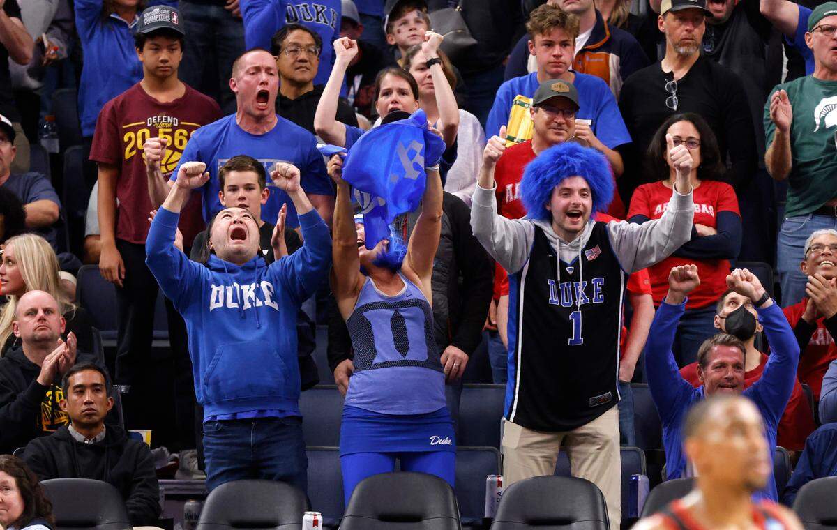 Blue Devils fans cheer on the team during the second half of Duke’s 78-73 victory over Texas Tech in the Sweet 16 round of the NCAA Tournament at the Chase Center in San Francisco, Calif., Thursday, March 24, 2022.