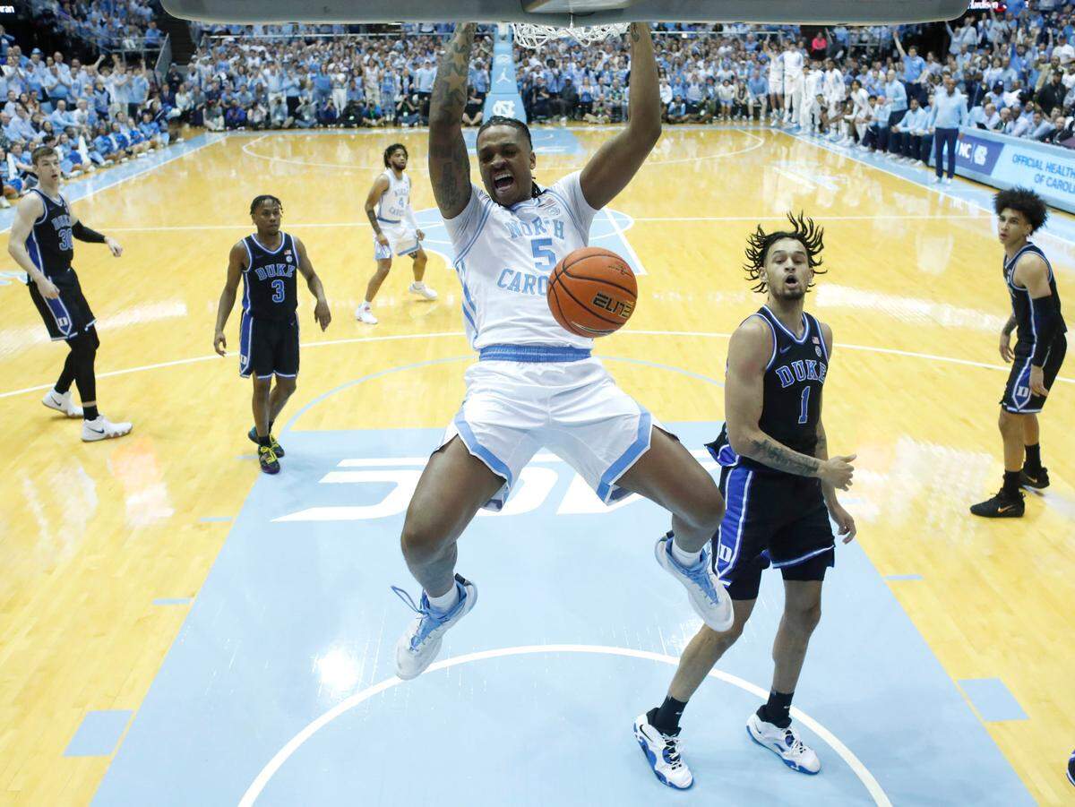 North Carolina’s Armando Bacot (5) slams in two during Duke’s 62-57 victory over UNC at the Smith Center in Chapel Hill, N.C., Saturday, March 4, 2023.