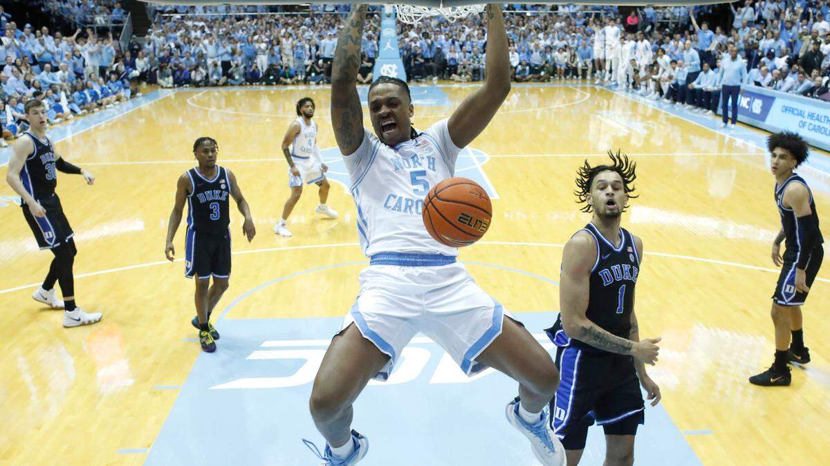 North Carolina’s Armando Bacot (5) slams in two during Duke’s 62-57 victory over UNC at the Smith Center in Chapel Hill, N.C., Saturday, March 4, 2023.