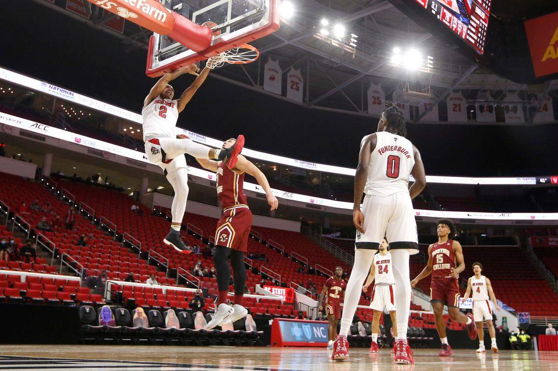 N.C. State’s Shakeel Moore (2) puts in two with two seconds left in the game during N.C. State’s 79-76 victory over Boston College at PNC Arena in Raleigh, N.C., Wednesday, December 30, 2020.