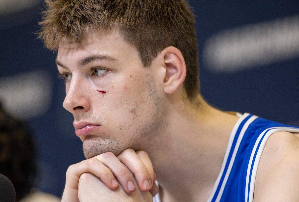 Duke’s Kyle Filipowski (30), with a cut under his eye from the game against Tennessee, listens to questions from the media following their 65-52 loss to Tennessee in the second round of the NCAA Tournament on Saturday, March 18, 2023 at the Amway Center in Orlando, Fla.