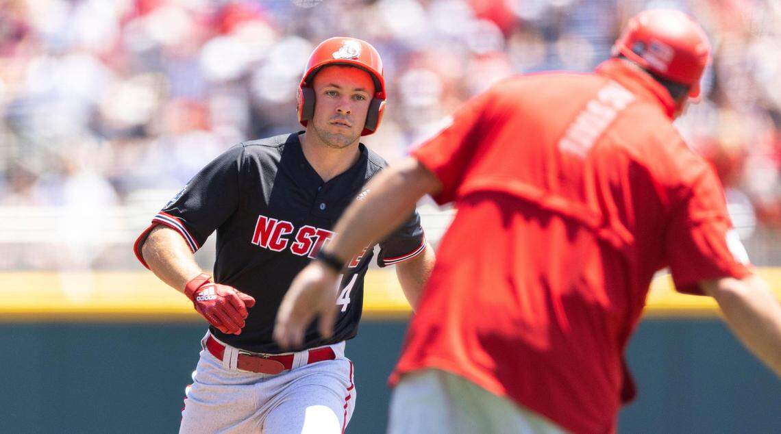 North Carolina State’s Jonny Butler (14) rounds the bases after hitting a two-run home run against Stanford in the first inning in the opening baseball game of the College World Series, Saturday, June 19, 2021, at TD Ameritrade Park in Omaha, Neb.