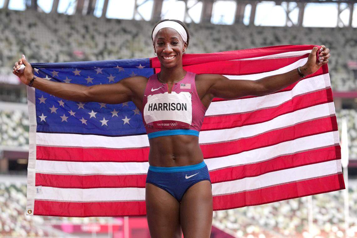 Kendra “Keni” Harrison, of the United States, celebrates after her second place finish in the women’s 100-meters hurdles final at the 2020 Summer Olympics, Monday, Aug. 2, 2021, in Tokyo.