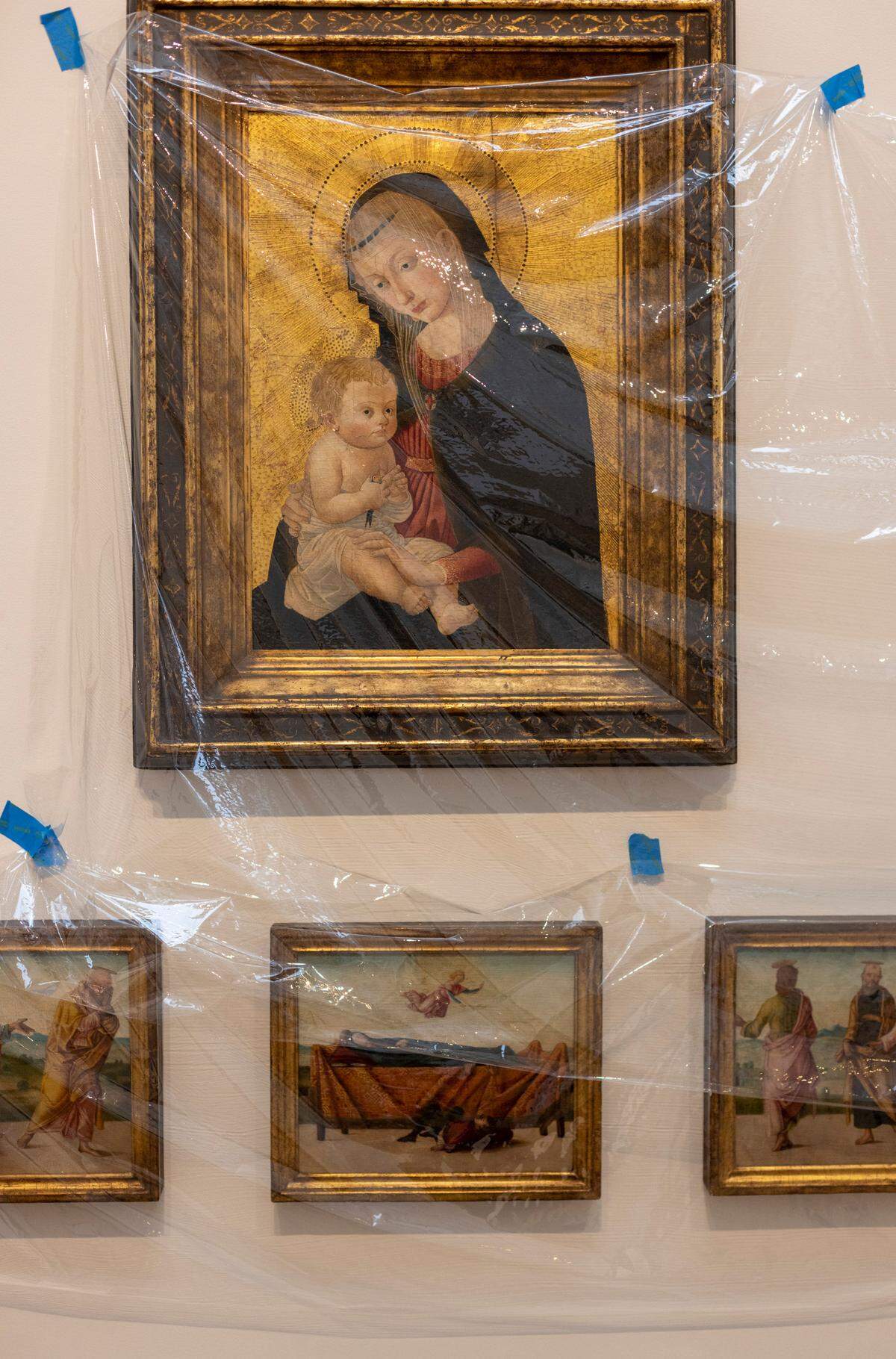 Paintings on Madonna Wall are covered with plastic as work is completed at the North Carolina Museum of Art’s reinstallation project on Sept. 20, 2022, in Raleigh.