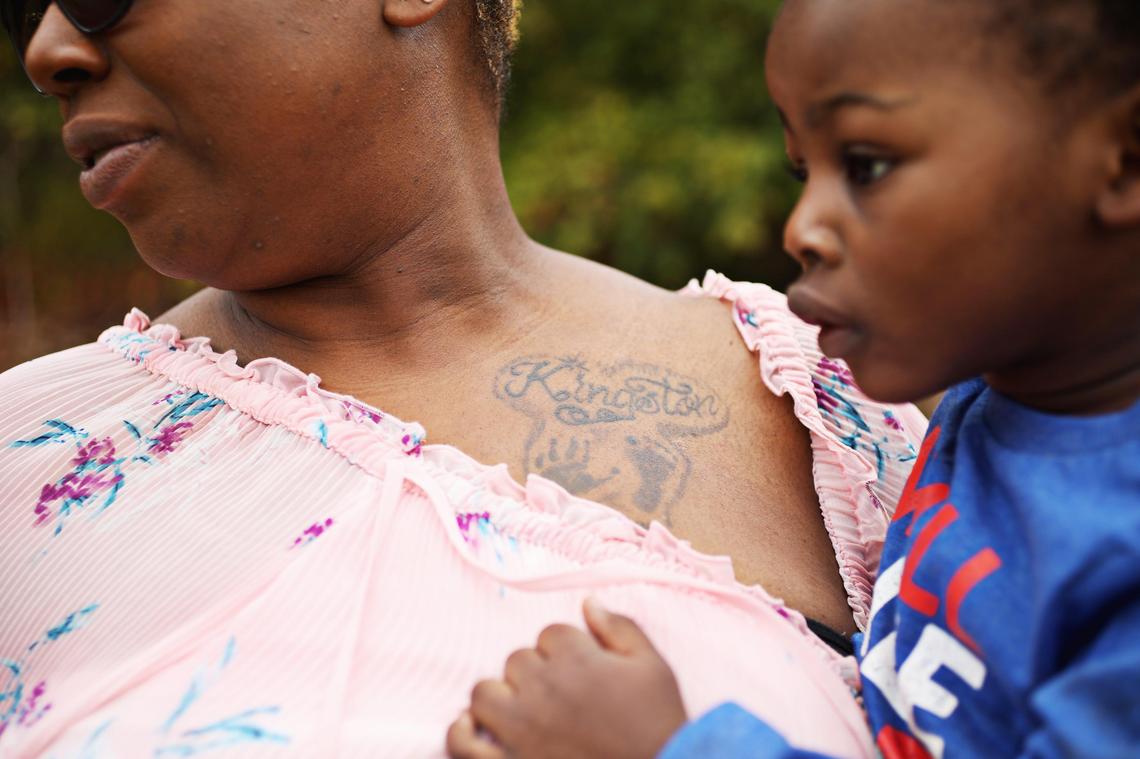 Durham resident Laura Miles had her first child, Kingston’s hand and foot prints tattooed on her chest shortly after he died in 2009. Kingston, who only lived briefly after birth, would be turning 11 this summer.