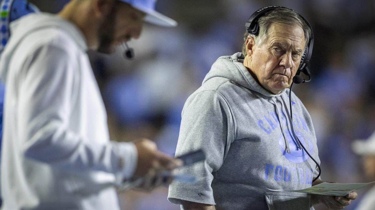 Down 41-7 in the third quarter to Texas Christian, North Carolina coach Bill Belichick glances at quarterbacks coach Matt Lombardi on Monday, September 1, 2025 at Kenan Stadium in Chapel Hill, N.C. 