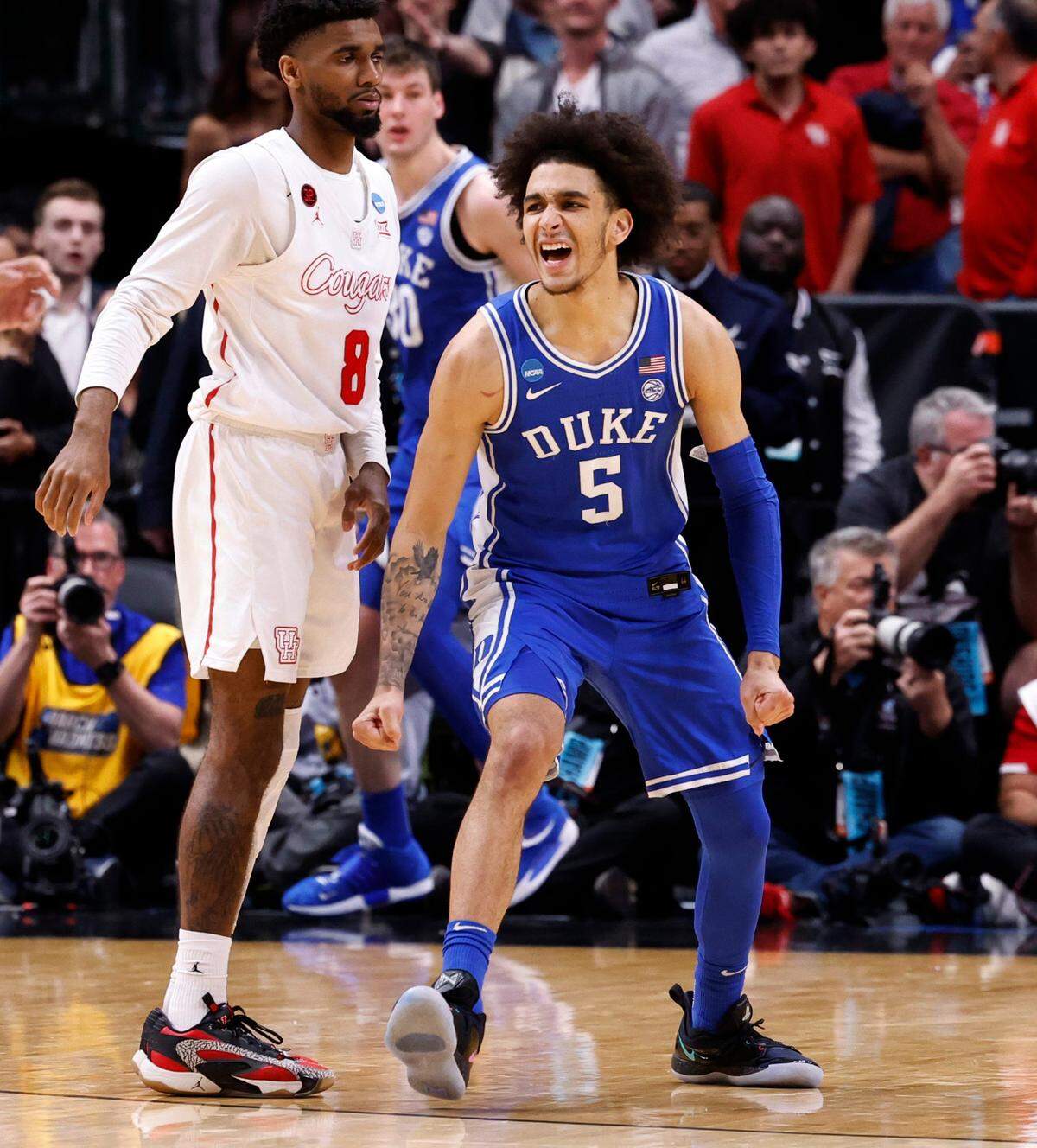Duke’s Tyrese Proctor (5) celebrates as time expires during Duke’s 54-51 victory over Houston in their NCAA Tournament Sweet 16 game at the American Airlines Center in Dallas, Texas, Friday, March 29, 2024.