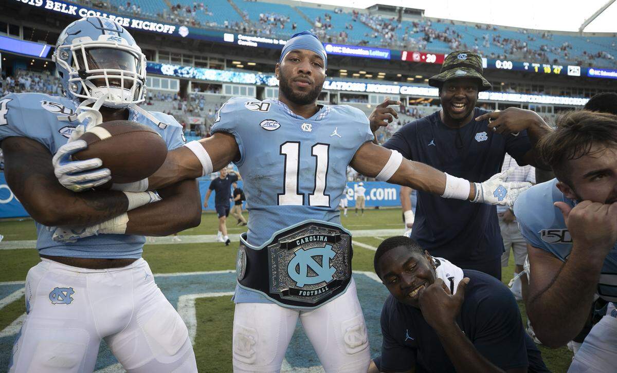 North Carolina’s Myles Wolfolk (11) celebrates the Tar Heels’ 24-20 victory over South Carolina on Saturday, August 31, 2019 at Bank of America Stadium in Charlotte, N.C. Wolfolk had two interceptions in the last thee minutes of the fourth quarter to help seal the Tar Heels’ victory.