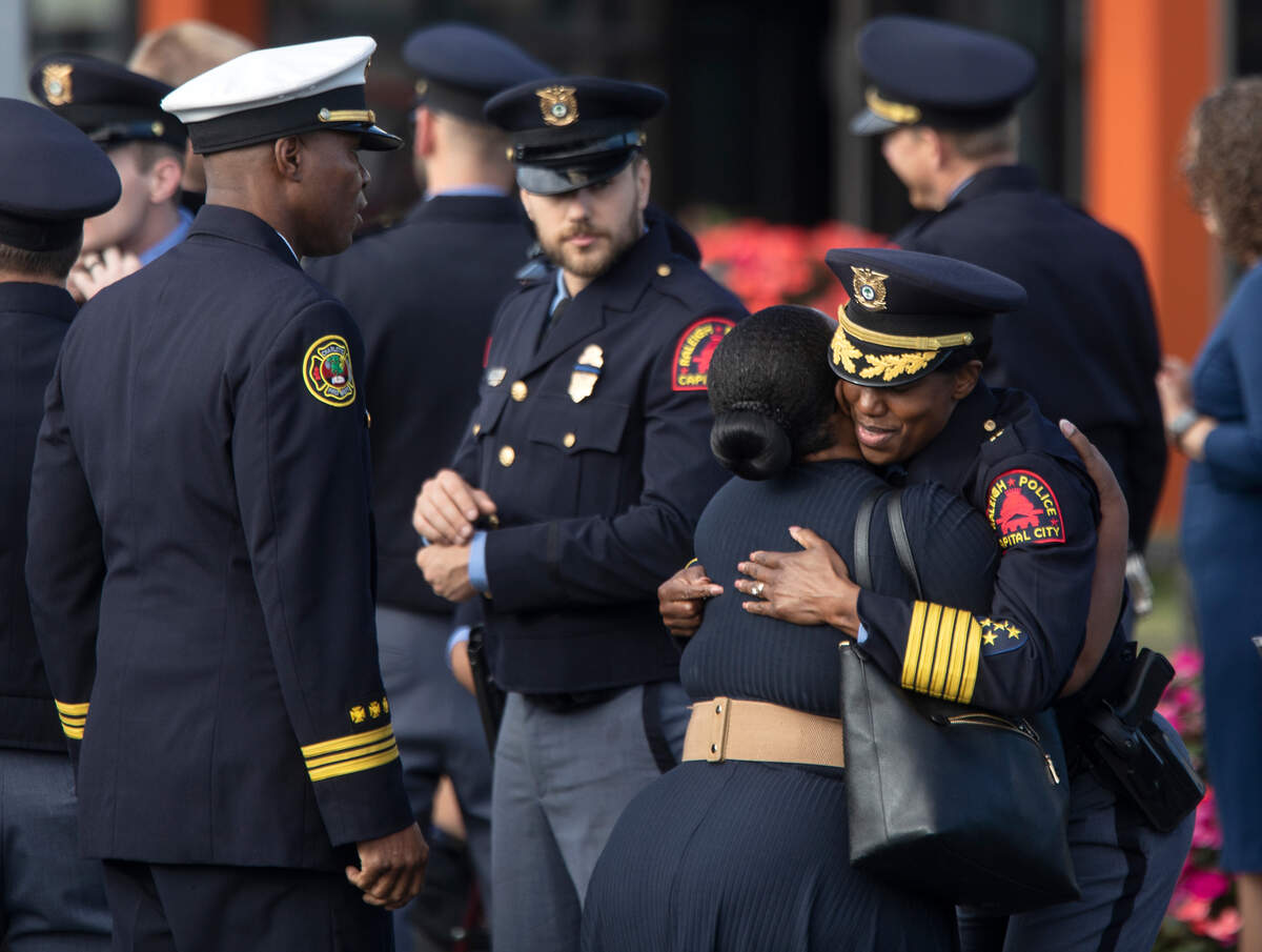 Police gather outside Cross Assembly Church on Saturday, Oct. 22, 2022, in Raleigh, N.C., prior to a funeral for Raleigh police officer Gabriel Torres, 29, who was one of five people fatally shot near the Hedingham neighborhood on Oct. 13.