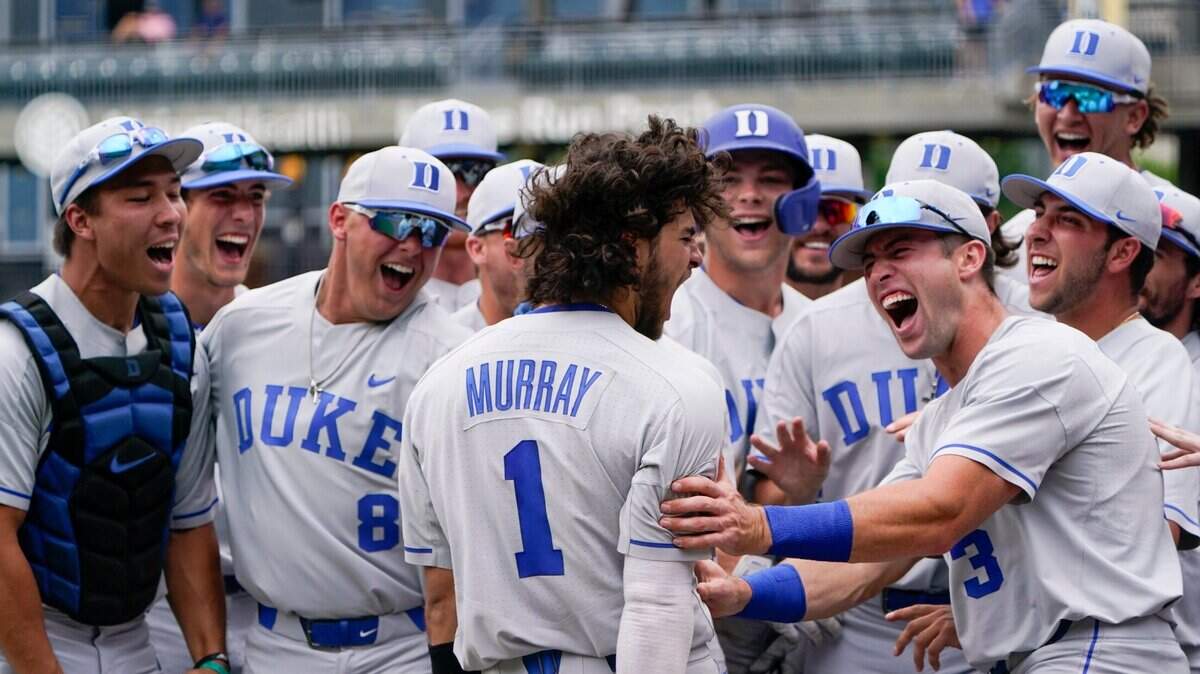 Duke’s Ethan Murray celebrates at the dugout after a home run against Virginia in the third inning of an NCAA college baseball game at the Atlantic Coast Conference tournament on Saturday, May 29, 2021, in Charlotte, N.C. (AP Photo/Chris Carlson)