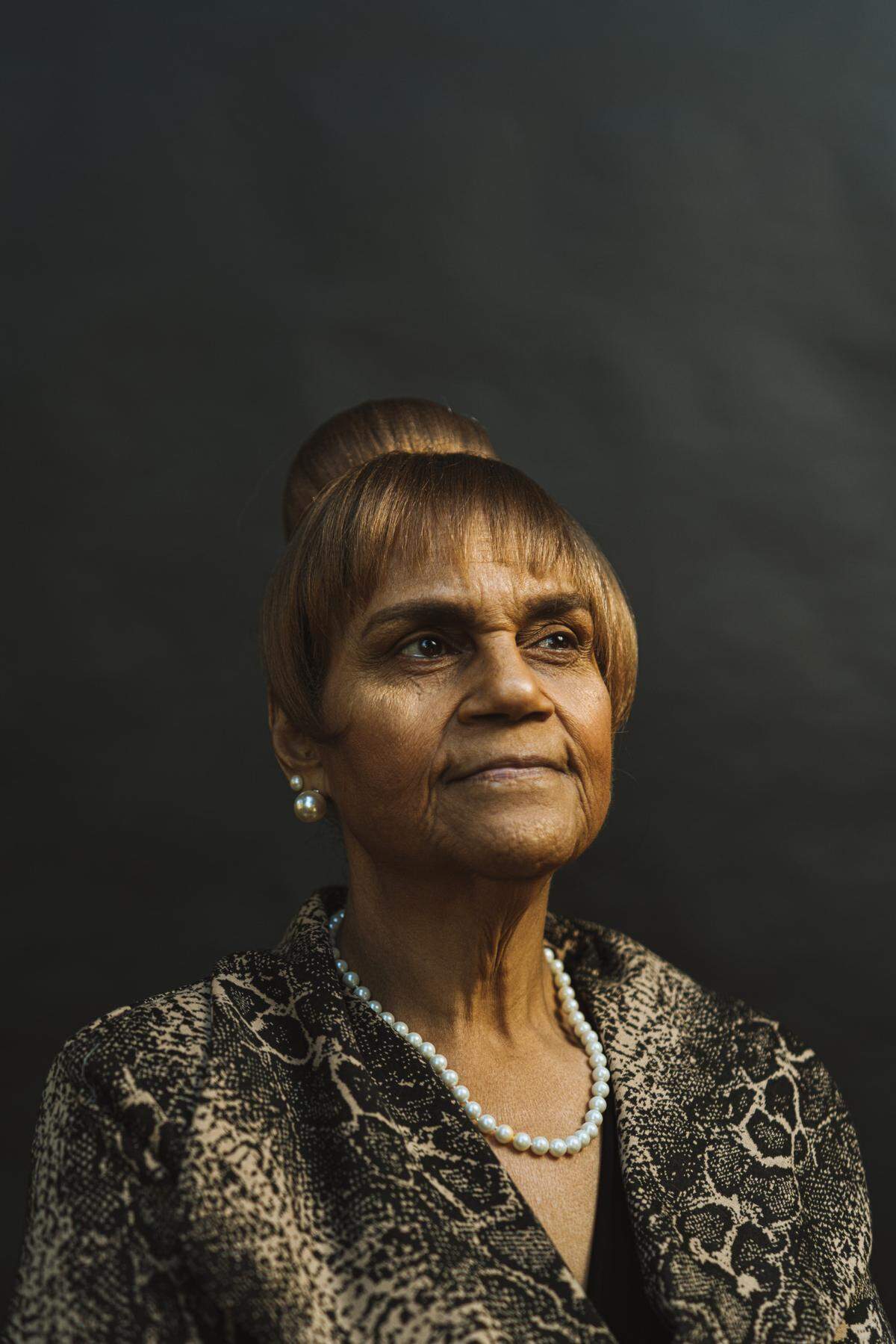 Portrait of Edith Jenkins Debnam in the ‘Voices of Oberlin,’ an exhibit displaying the stories of elders who grew up in one of North Carolina’s longest-surviving Black freedman’s villages. Jenkin Debnam’s portrait is one of 20 located in the Raleigh Municipal building’s Block Gallery. Photo by Derrick Beasley.