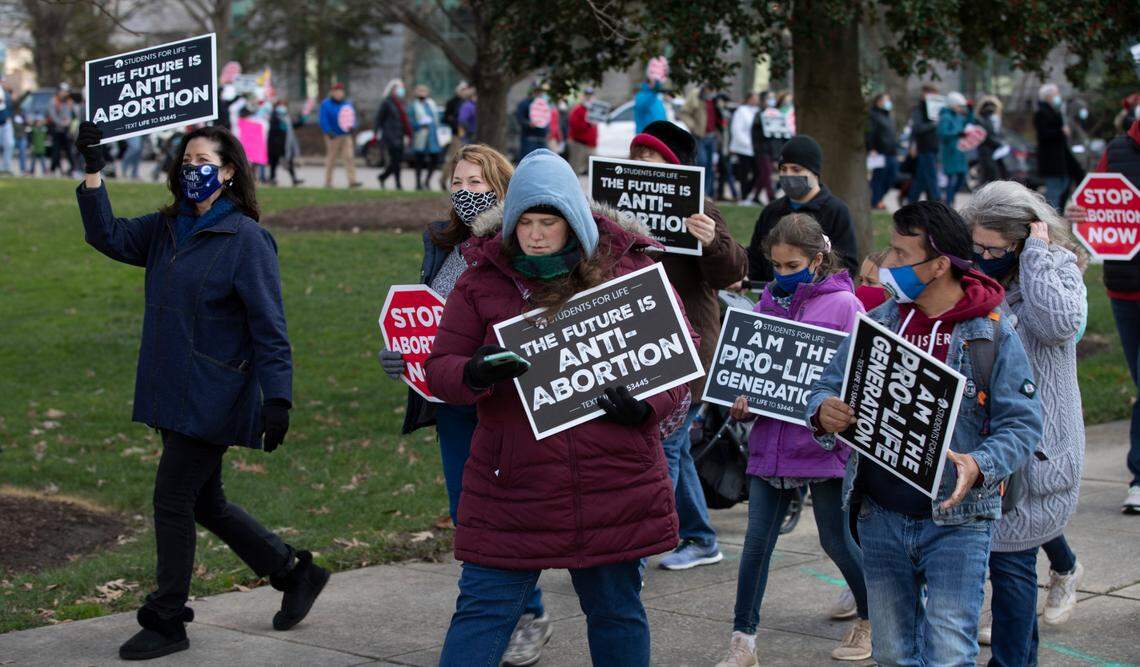 Hundreds of Right to Life advocates march around the Legislature after a rally on the Bicentennial Mall during the 2021 Rally and March for Life on Saturday, January 16, 2021 in Raleigh NC.
