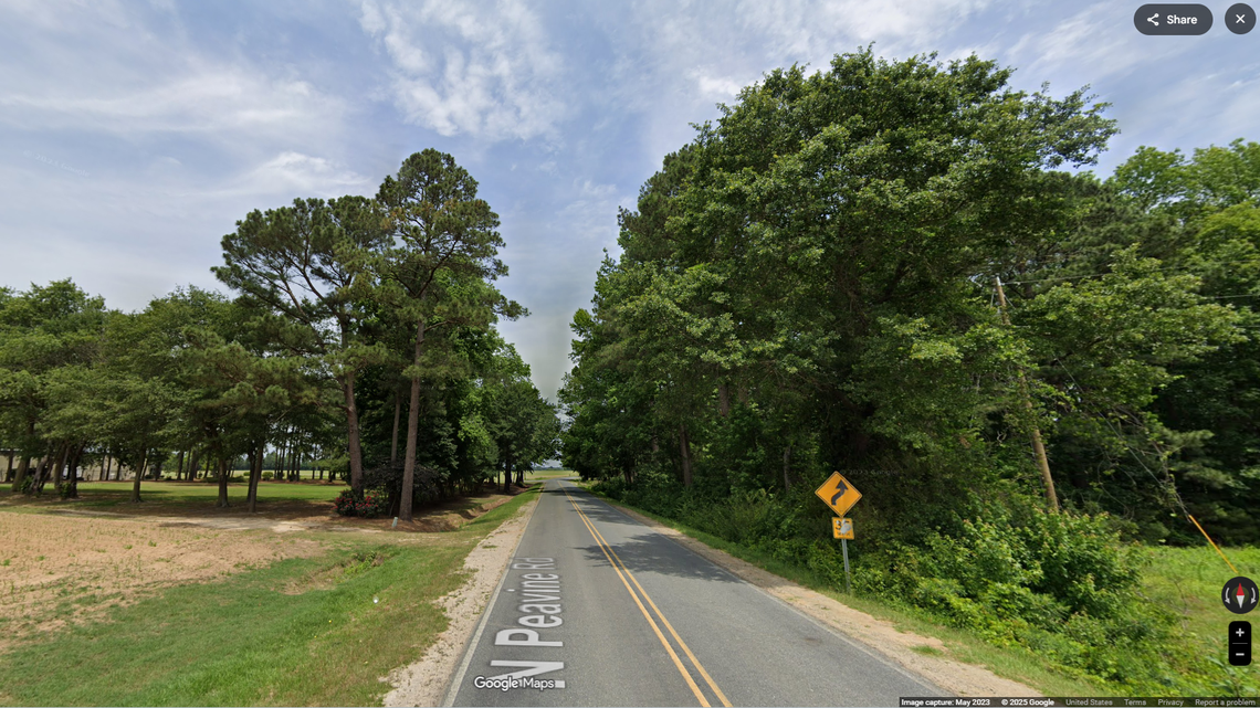 The body was found  at a home on North Peavine Road, east of Clinton. The dog suspected of killing the woman was euthanized, officials say..