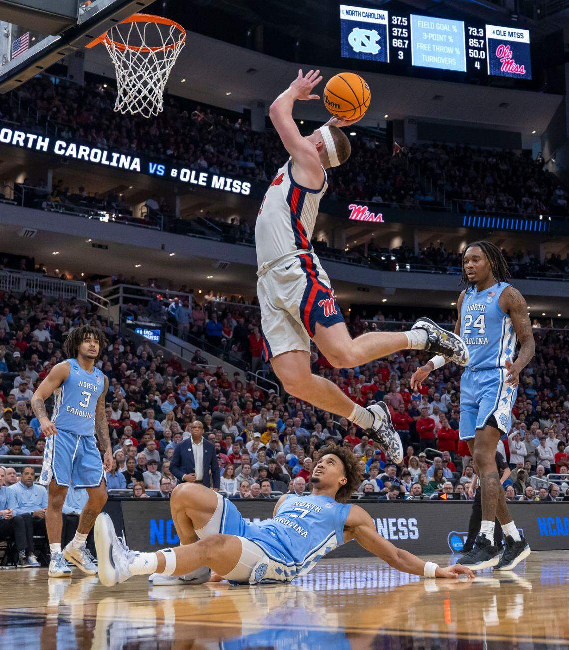 North Carolina guard Seth Trimble (7) watches as Ole Miss guard Sean Pedulla (3) scores in the first half during the first round of the NCAA Tournament on Friday, March 21, 2025 at Fiserv Forum in Milwaukee, Wisconsin.