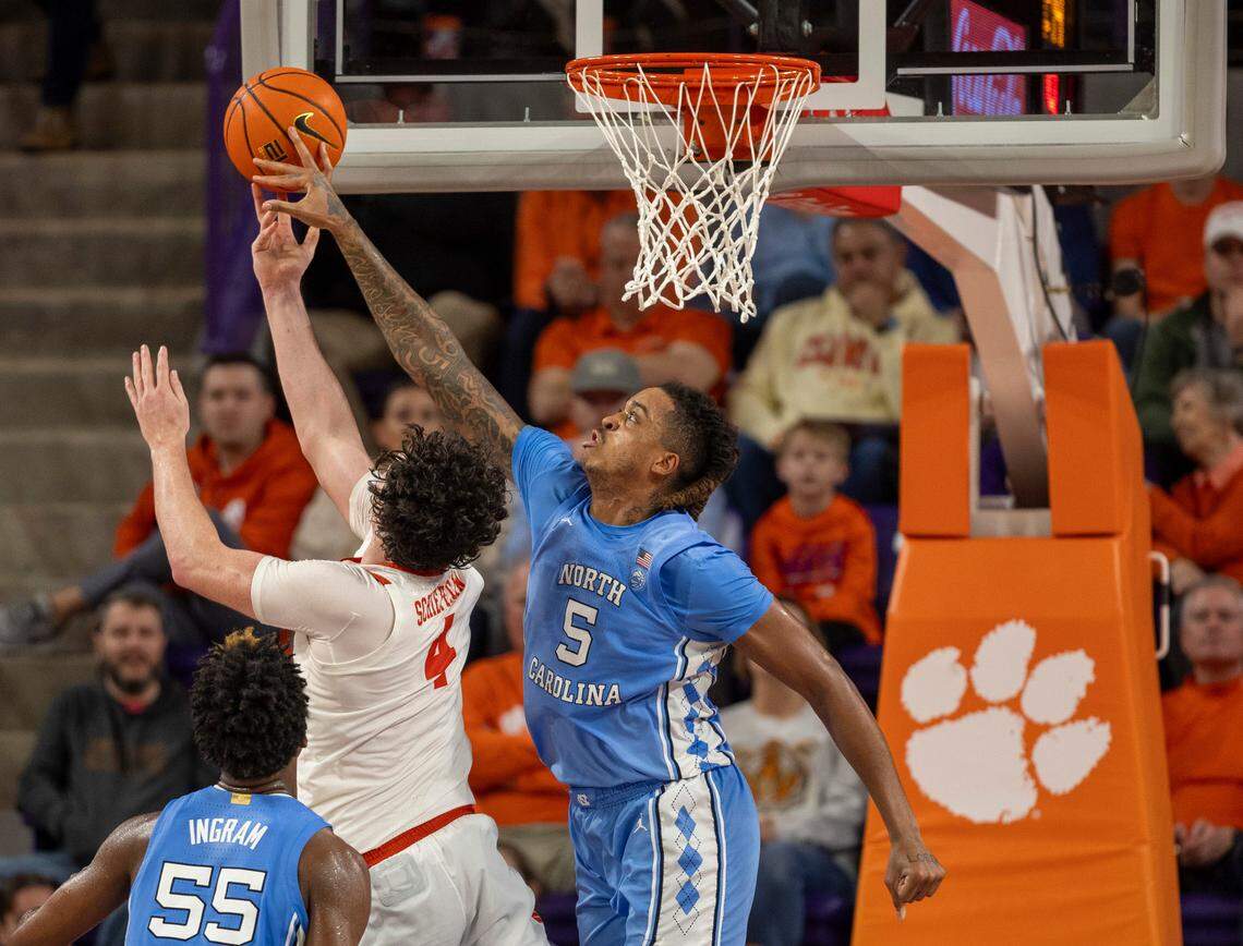 North Carolina’s Armando Bacot (5) blocks a shot by Clemson’s Ian Schieffelin (4) in the second half on Saturday, January 6, 2024 at Littlejohn Coliseum in Clemson, S.C.