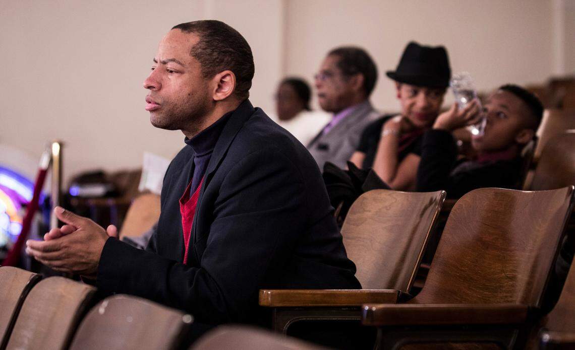 Javon Wilson, a lifelong member of Mt. Vernon Baptist Church, claps along to music during church service on Sunday, Jan. 13, 2019.