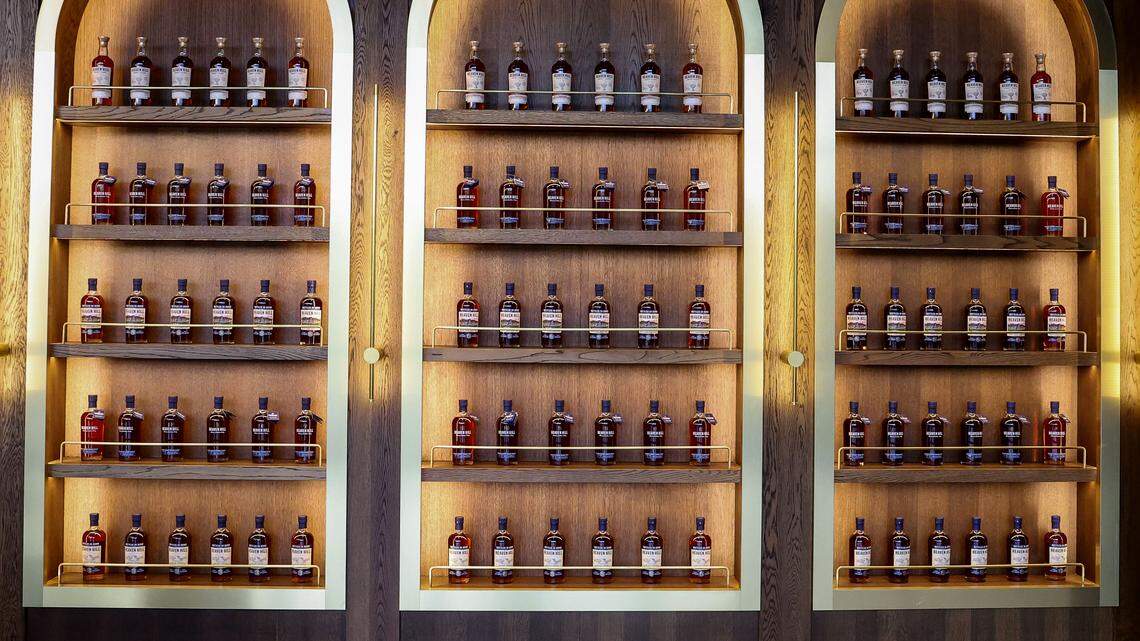 Bottles of Kentucky bourbon from Heaven Hill distillery sit on shelves at its Bardstown, Kentucky, facility.