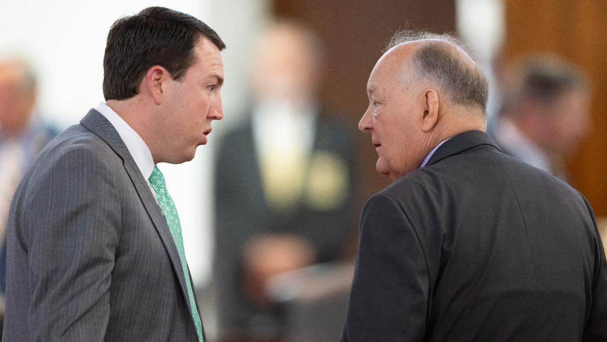 Senator David W. Craven, left, talks with Senator Brent Jackson, co-chair of the Senate Agriculture, Energy and Environment committee prior to the Senate session on Wednesday, June 18, 2025 at the N.C. General Assembly in Raleigh, N.C.