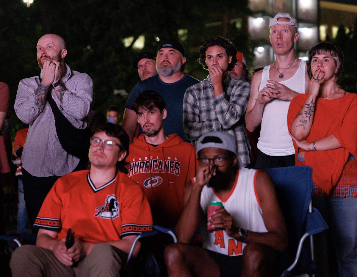 Fans at a watch party at Moore Square react as time expires in the third period of the Carolina Hurricanes’ Game 2 Stanley Cup Final matchup against the Vegas Golden Knights on Thursday, June 4, 2026, in Raleigh, N.C.