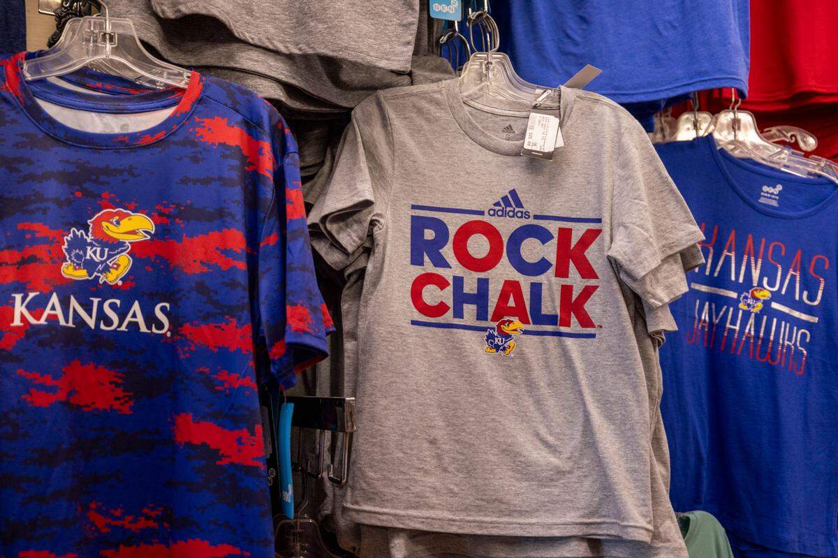 University of Kansas merchandise features their ‘Rock Chalk, Jayhawk’ chant, a tradition that dates to 1886 when chemistry professor E.H.S. Bailey and his colleagues created it.