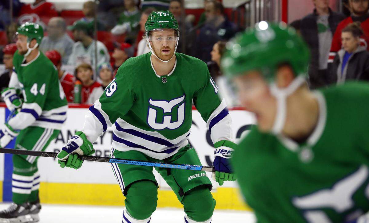 Carolina Hurricanes’ Dougie Hamilton (19) skates during warmup prior to the start of the Hurricanes game with the Boston Bruins, Sunday, Dec. 23, 2018, in Raleigh, N.C. (AP Photo/Karl B DeBlaker)