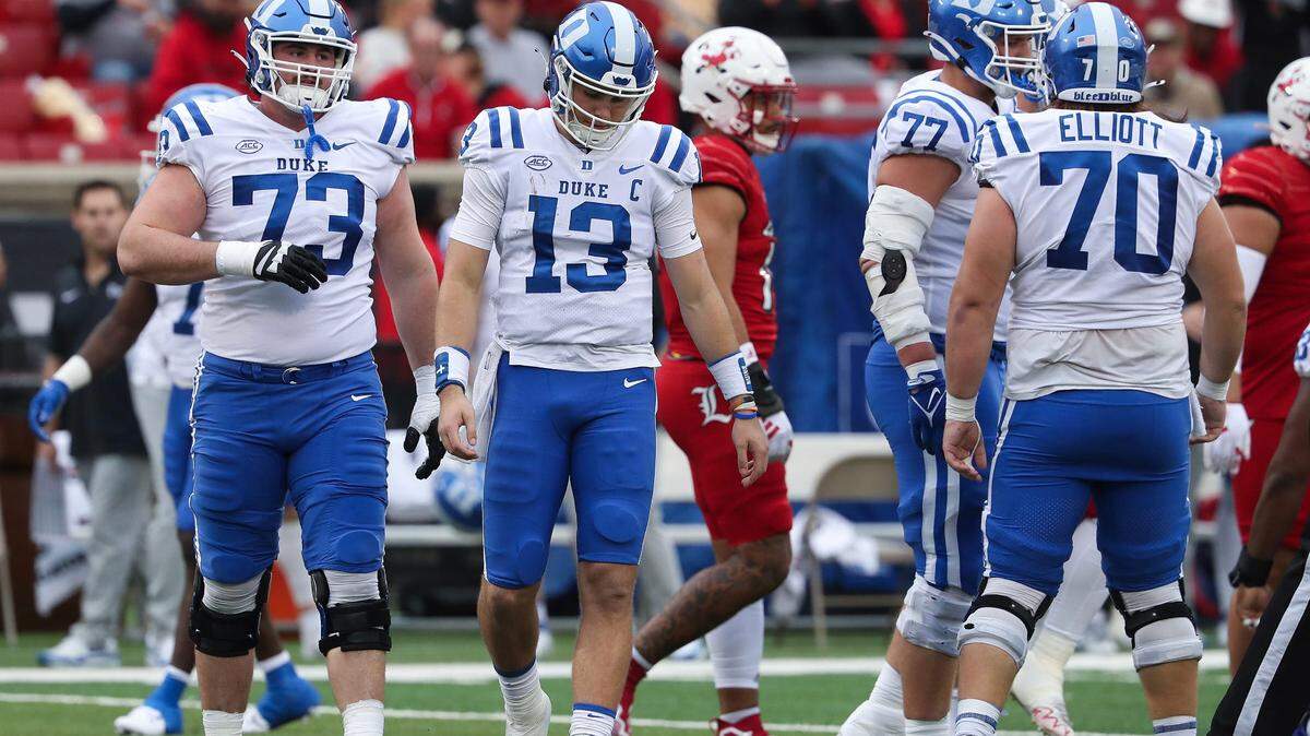 Duke QB Riley Leonard (13) was dejected after he was sacked by the U of L defense during their game at the L&N Stadium in Louisville, Ky. on Oct. 28, 2023.
