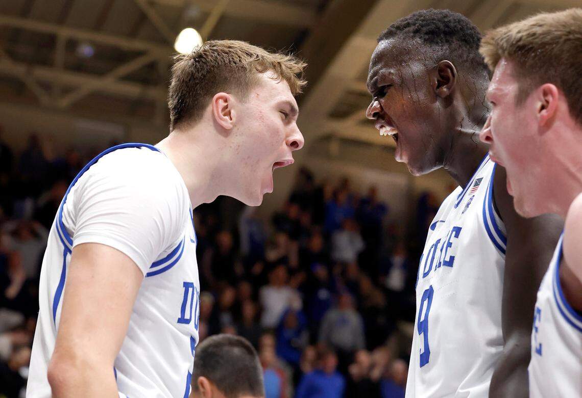 Duke’s Cooper Flagg (2) celebrates with Khaman Maluach (9) and Kon Knueppel (7) after slamming in two during the second half of Duke’s 76-47 victory over Pitt at Cameron Indoor Stadium in Durham, N.C., Tuesday, Jan. 7, 2025.