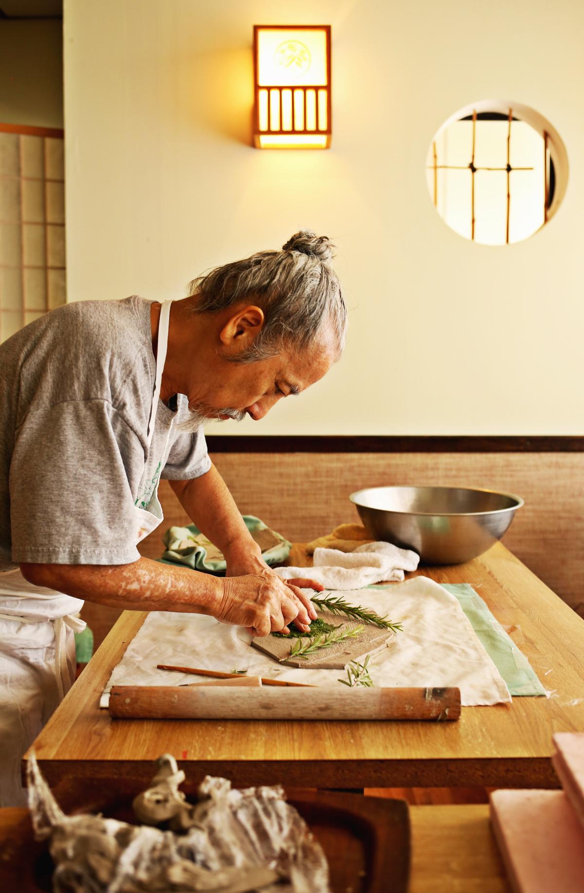 Chef George Yamazawa hand-builds pottery for his Durham restaurant, Yamazushi, July 13, 2017. Yamazawa goes to painstaking lengths to ensure the guest's dining experience lives up to his standards at his kaiseki restaurant.