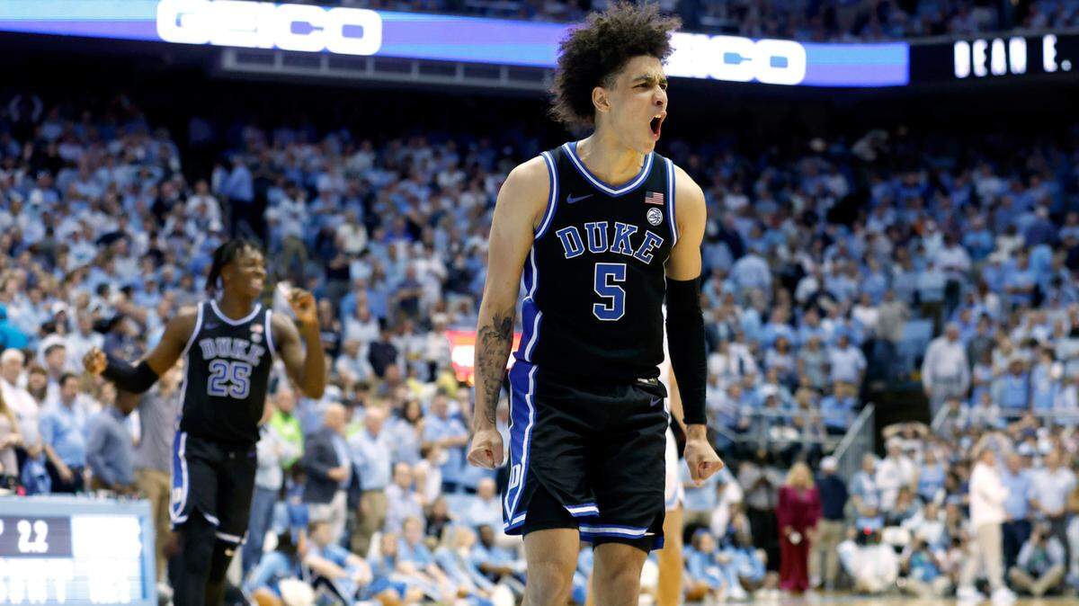 Duke’s Tyrese Proctor (5) celebrates as time runs out during Duke’s 62-57 victory over UNC at the Smith Center in Chapel Hill, N.C., Saturday, March 4, 2023.