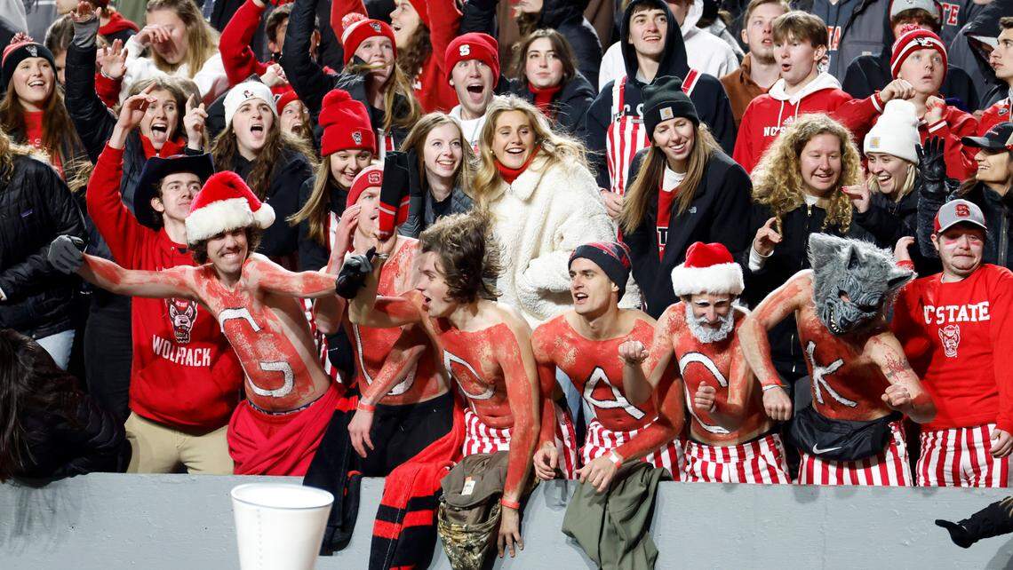 Fans cheer on the Wolfpack during the second half of N.C. State’s 39-20 victory over UNC at Carter-Finley Stadium in Raleigh, N.C., Saturday, Nov. 25, 2023.