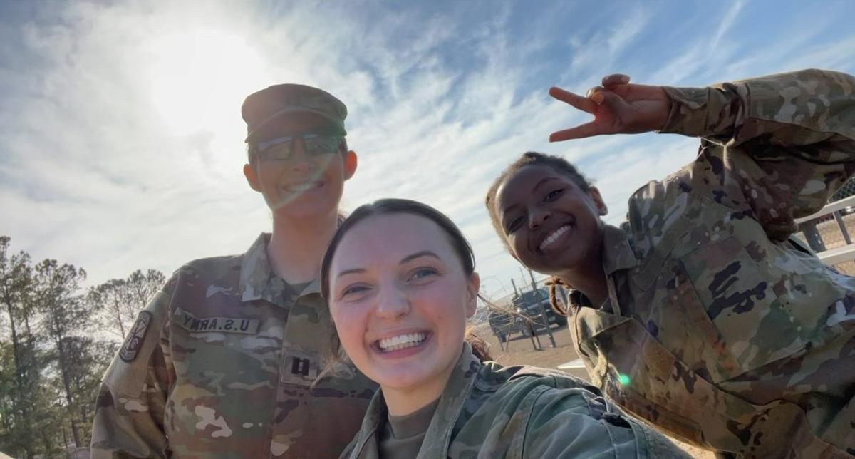 Fayetteville State University professor and ROTC instructor Captain Brittany Truesdale (left) and cadets Kaylenna Ingham (center) and Desiree Bliss (right) pose for a photo.