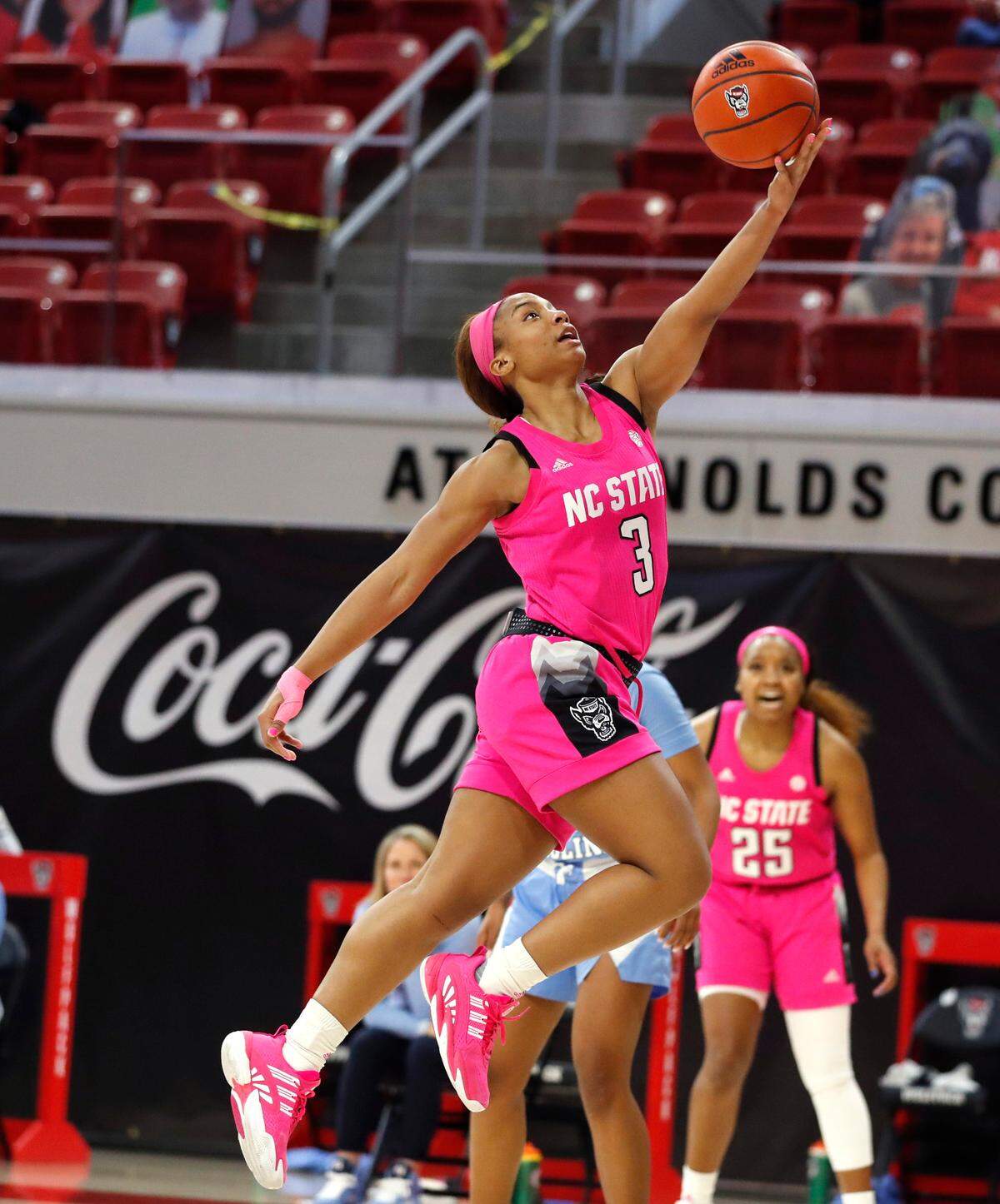 N.C. State’s Kai Crutchfield (3) shoots during the first half of N.C. State’s game against UNC in the annual Play4Kay game at Reynolds Coliseum in Raleigh, N.C., Sunday, February 21, 2021.
