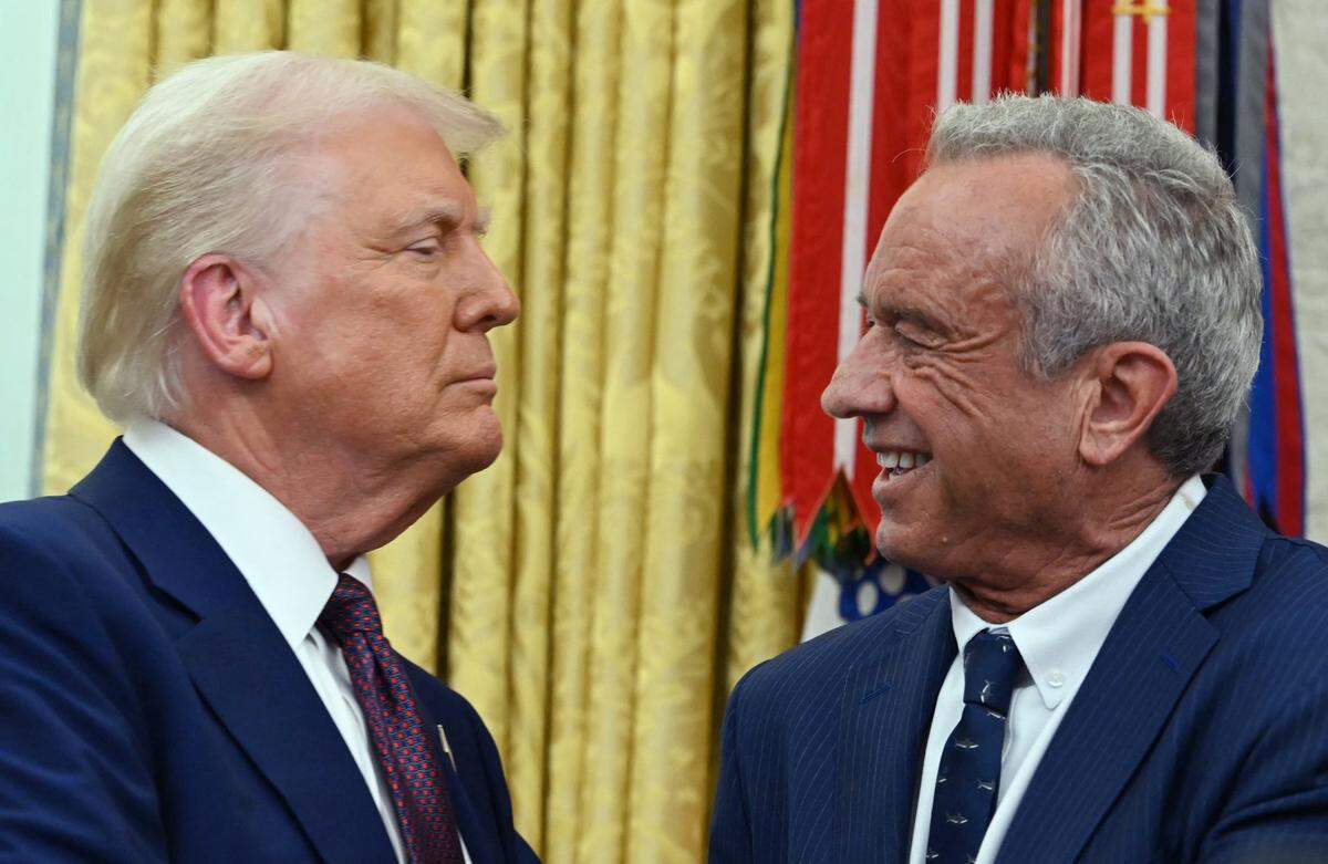 U.S. Secretary of Health and Human Services Robert F. Kennedy Jr. and President Donald Trump shake hands after a swearing in ceremony in the Oval Office of the White House in Washington, D.C., on Feb. 13, 2025.