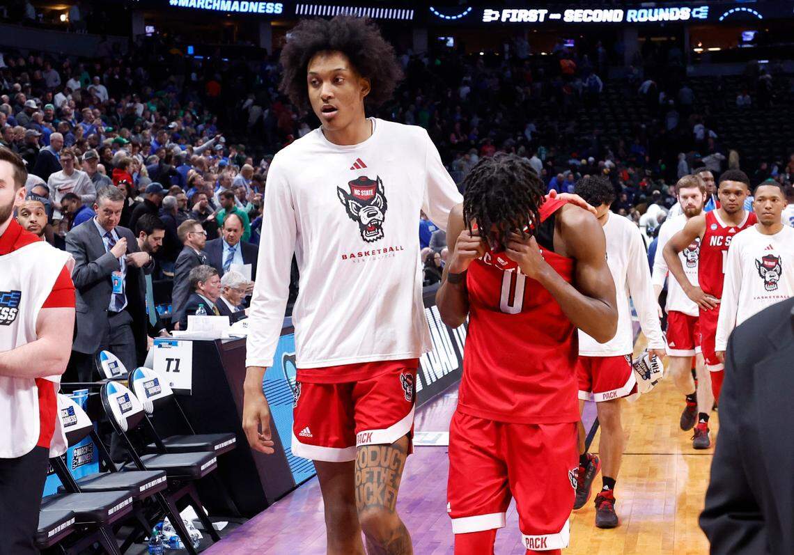 N.C. State’s Isaiah Miranda, left, walks off the court with Terquavion Smith after Creighton’s 72-63 victory over N.C. State in the first round of the NCAA Tournament at Ball Arena in Denver, Colo., Friday, March 17, 2023.